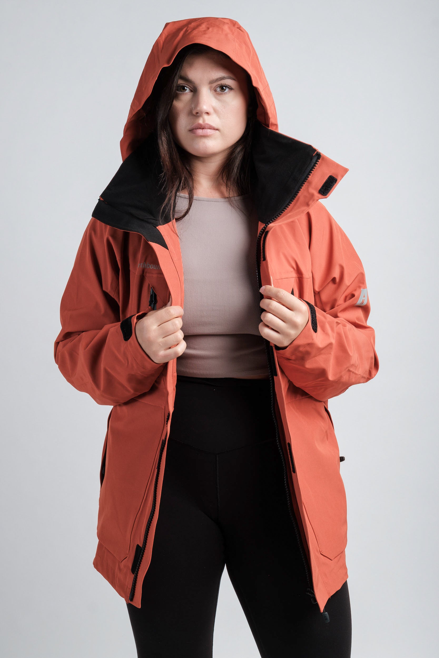 Northbound Gear women's orange Apex waterproof jacket styles
